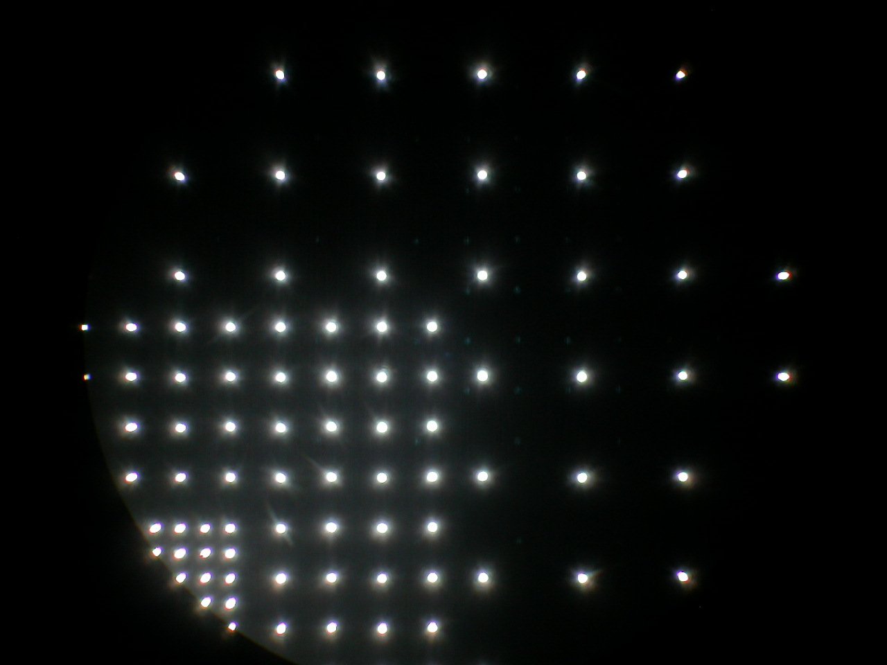 Hole array in stainless steel using an infrared laser