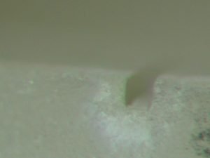 Here you can see the square profile laser milled channel that is 90 µm deep by 75 µm wide.