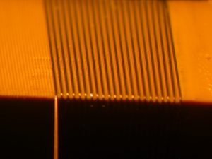 The wires in this micro-array were wound and adjusted using an apparatus invented by Precision MicroFab.