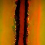 A very ratty attempt to cut a channel in fused silica. Notice the high degree of chipping and cracking.