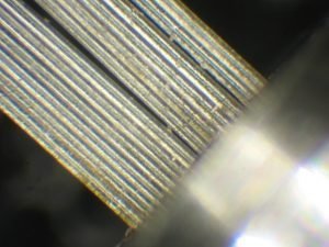 This fiber optic array was populated with 79 μm diameter fibers with a tolerance of +9/-0 μm.