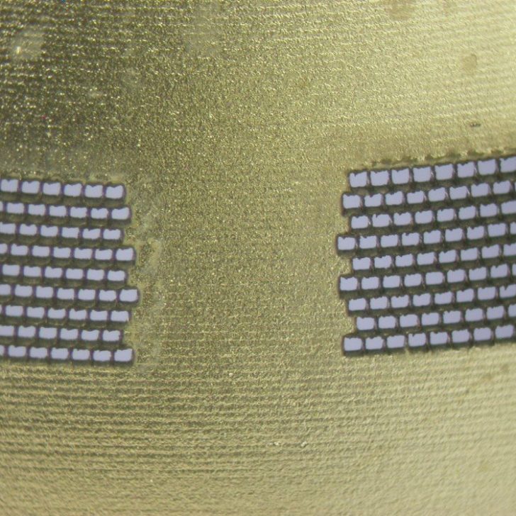 Each one of the four windows was made up of over 4,000 individual laser drilled holes with a diameter of 0.0004 inches each or 10.160 µm.