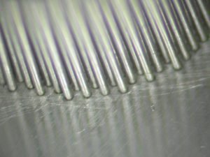 Quantum particle nozzle with 50 micron ID tubes